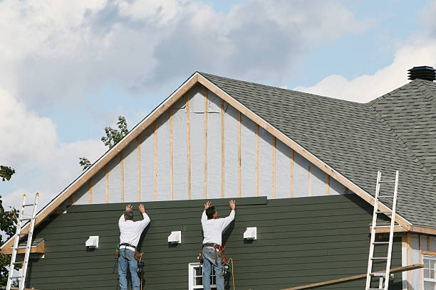 Professional Siding Replacement technician working in Nicktown, PA